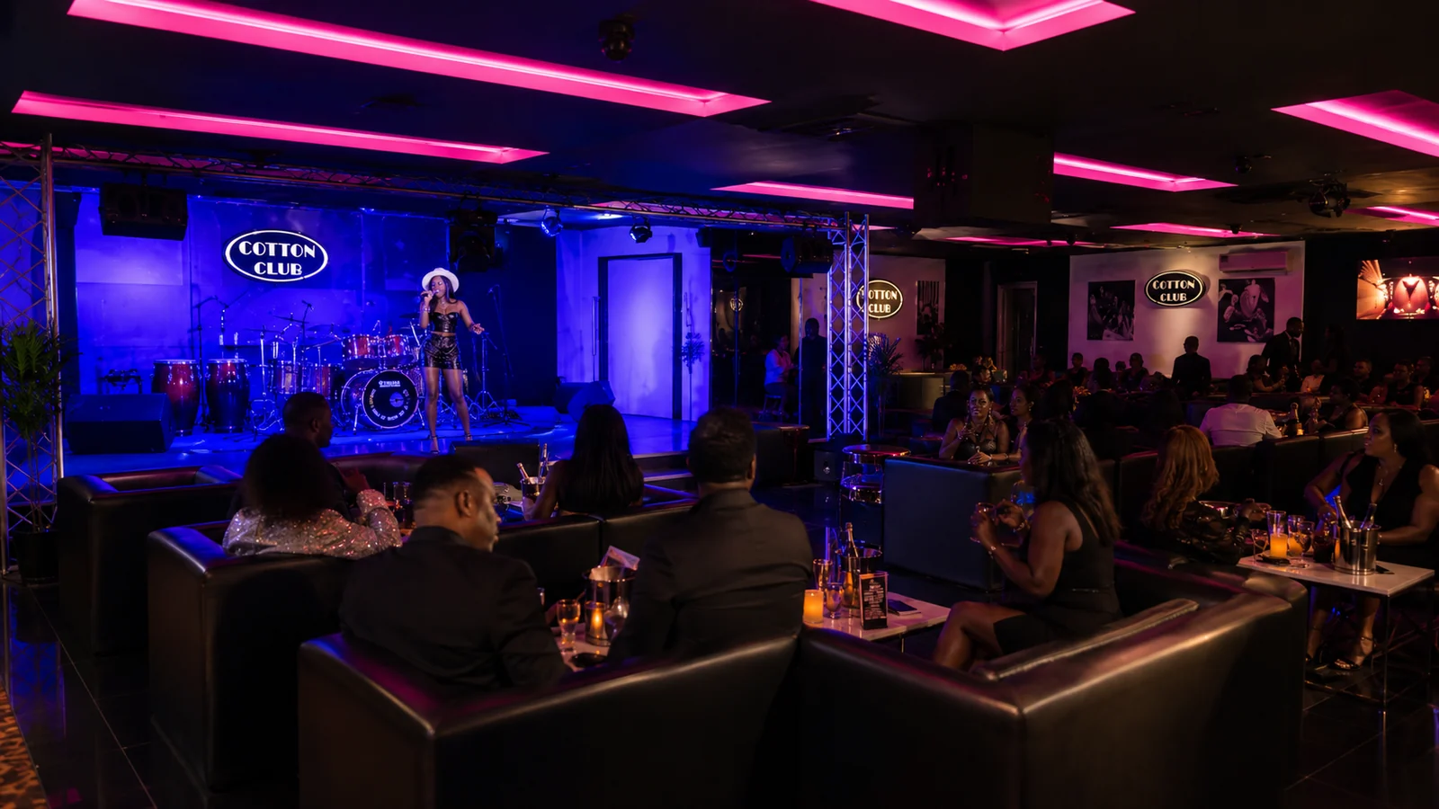 Cotton Club lounge with guests and live stage